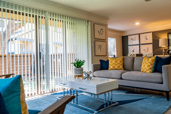 a living room with a couch and a coffee table